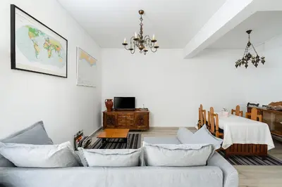 a living room with a couch and a table at Casa Mina in Faro