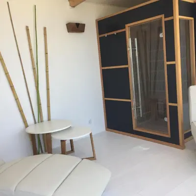 a room with a table and a glass door at Chambre d Hôte exclusif Naturiste et Nudiste CASA AMSYL adultes only in Paderne