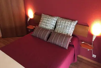 a bedroom with a bed with two pillows on it at Guesthouse RSA by Umbral in Almancil