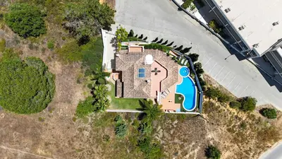 an overhead view of a house with a swimming pool at Villa Duma in Albufeira