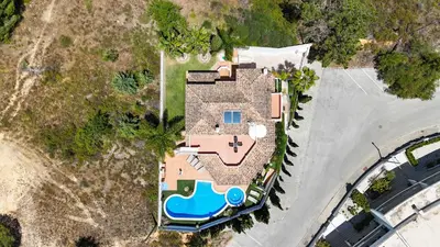 an overhead view of a house with a swimming pool at Villa Duma in Albufeira