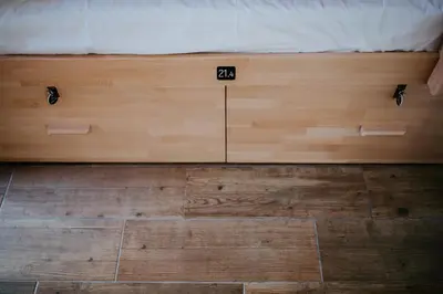 a bed with a wooden floor with the numbers on it at DREAMS HOUSE in Faro