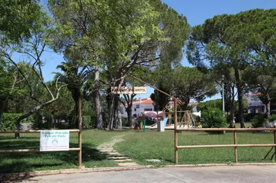 a park with a sign and a playground at Acoteias Studio by be@home in Albufeira