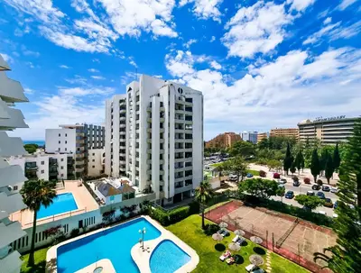 an apartment with a swimming pool in a city at FLH Vilamoura Sunny Apartment with Pool in Vilamoura