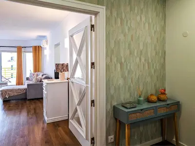 a room with a door leading to a living room at FLH Vilamoura Sunny Apartment with Pool in Vilamoura