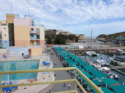 a view of a marina with a swimming pool at AMM SeaView Marina Albufeira apartment in Albufeira