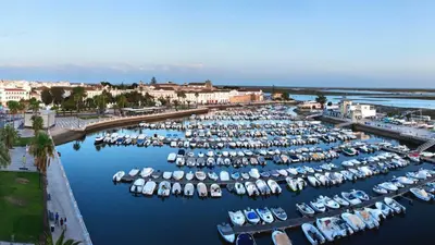 an aerial view of a marina with boats in the water at Casa da Mouraria in Faro