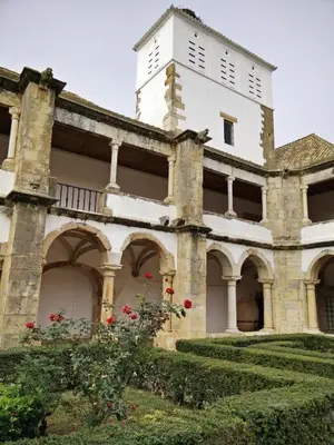 an old building with a tower on top of it at Casa da Mouraria in Faro