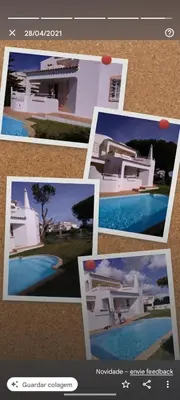 a white house with a black and white fence at Nightingale Villa in Albufeira