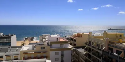 a view of the ocean from a building at Atlantico 8- Vista Mar, Ar-Condicionado, 80mt Praia, Wifi in Quarteira