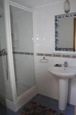 a bathroom with a shower and a sink at 4 bedroom town house Vale de Parra, close to Gale AT22 in Guia