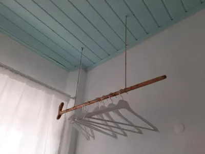 a chandelier hanging from a ceiling in a room at Traditional House in Historical Center of Faro in Faro
