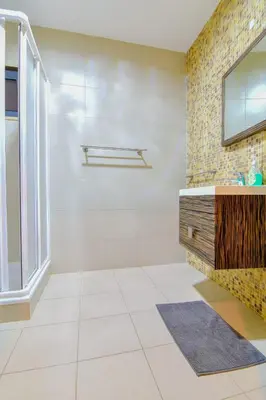 a bathroom with a sink and a mirror at Stunning Villa with Pool in Albufeira