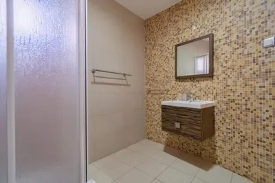 a bathroom with a sink and a mirror at Stunning Villa with Pool in Albufeira