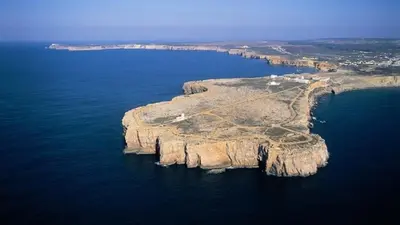 an aerial view of an island in the ocean at Apartamentos Roja Sol in Albufeira