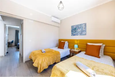a room with two beds in a room at Vista Mar e Terra in Albufeira