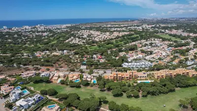 an aerial view of a city with buildings and trees at VILLA SIBLING 2 in Vilamoura