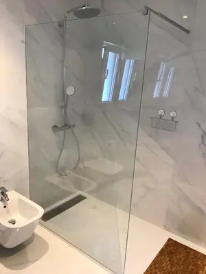 a bathroom with a shower and a sink at São Rafael Beach Apartment in Albufeira