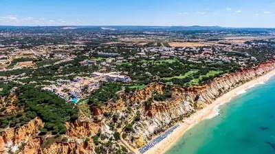 an aerial view of a beach and the ocean at AlbufeiraOrada Splendor by Be Cherish in Albufeira