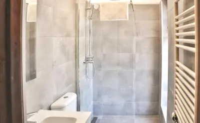 a bathroom with a shower with a toilet and a sink at Elegant Villa in Vilamoura with Private Pool in Vilamoura