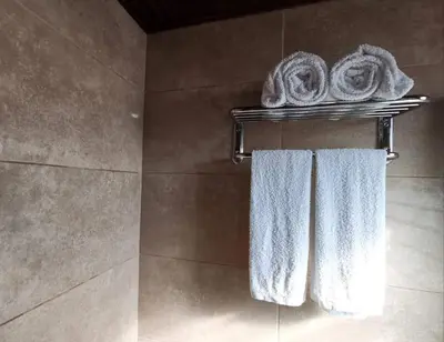 two towels on a towel rack in a bathroom at Vilamoura T1 com piscina - Mouramar I in Vilamoura