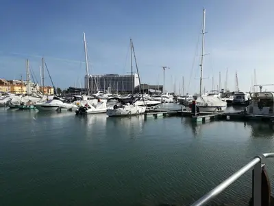 a bunch of boats are docked in a marina at Vilamoura T1 com piscina - Mouramar I in Vilamoura