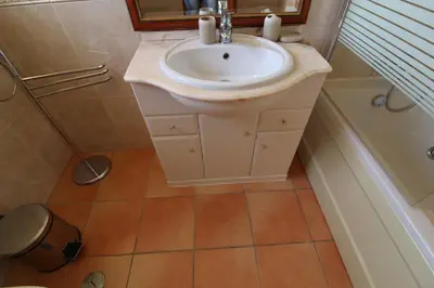 a bathroom with a sink and a shower at Villa Martina - São Rafael - Albufeira in Albufeira