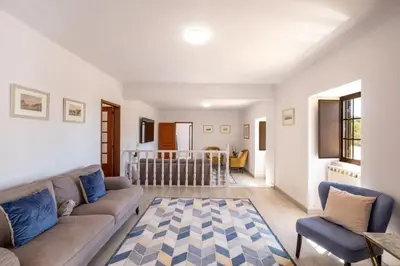 a living room with a couch and a chair at Casa Katarina - Private Villa - Heated pool - Free Wifi - Air Con in Tunes