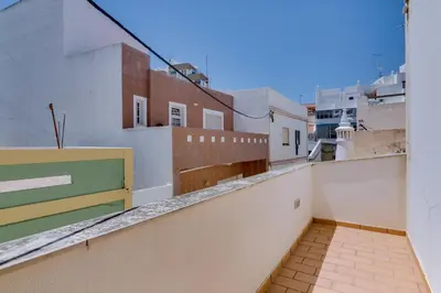 a view from the balcony of a building at Casa Luz - Quarteira in Quarteira