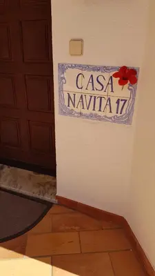 a sign that reads casa navidad next to a door at Villa Navita in Loulé
