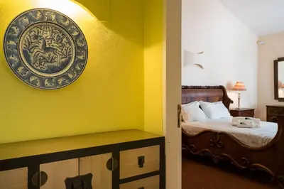 a bathroom with a sink and a mirror at BmyGuest - Falésia Beach Villa in Albufeira