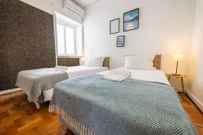 a bedroom with two beds and a window at Greenth Avenue in Faro