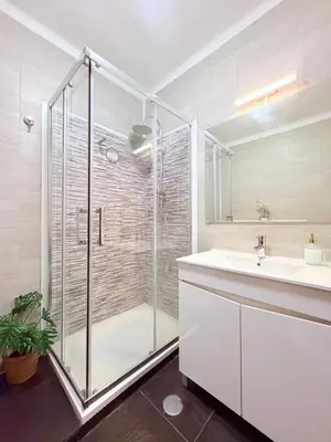 a bathroom with a shower and a toilet and a sink at Albufeira Center Old Town, 8ppl, 5min Fishermans beach in Albufeira