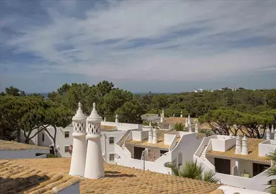 a view from the roof of a white building at Vicky Rae Beach House - Vale do Lobo in Almancil