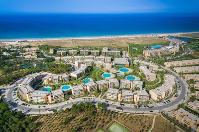 an aerial view of a resort near the ocean at Apartamentos Vila das Lagoas – Salgados in Guia