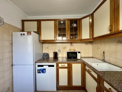two beds in a room with a window at Vilamoura Ocean Villa with Pool by Homing in Vilamoura