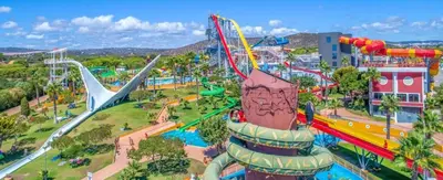 an amusement park with a roller coaster and slides at Vilamoura Center - Near Marina By Vilamoura Sun in Quarteira