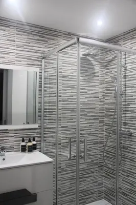 a bathroom with a shower and a sink at Casa do Largo in Faro