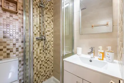 a bathroom with a sink and a shower at #006 Foxy D by Home Holidays in Albufeira