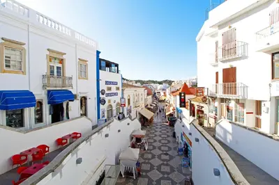a view of a street in a town with buildings at Albufeira Concept 1 with Pool by Homing in Guia