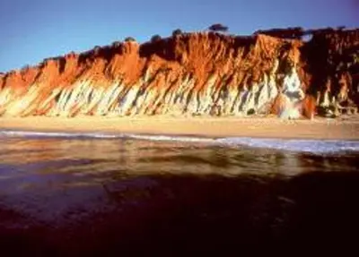 a view of a beach with a large cliff at Studio - Praia da Falesia - Algarve in Albufeira