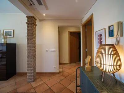 a living room with a lamp on a table at Apartment Vilas Mouriscas by Interhome in Vilamoura
