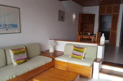 a living room with two couches and a table at Albufeira, One step to the beach (13) in Albufeira