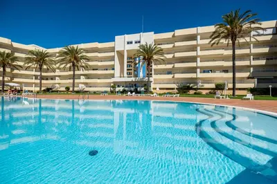 a large swimming pool in front of a building at VR Galé Mar in Albufeira