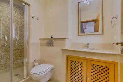 a bathroom with a toilet and a sink and a shower at Victoria Boulevard - Vasco da Gama - Vilamoura in Vilamoura