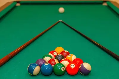 a pile of billiard balls on a pool table at Villa California by Algarve Vacation in Albufeira
