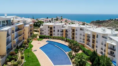 a corridor of a hospital hallway with a hallway at BnB Homes Ocean view Apartment with 3 spacious Terraces, 2 Swimming pools & Tennis court in Albufeira