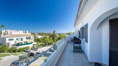 a balcony with a view of a street at Sienna in Vale do Lobo