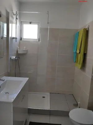 a bathroom with a toilet and a sink at Alsol C 5365-1 in Quarteira