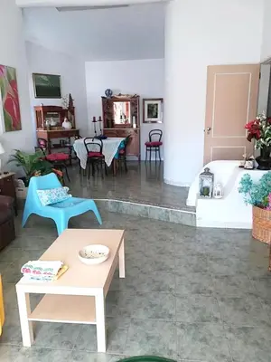 a living room with a couch and a table at Luxurious villa in Albufeira with pool in Albufeira
